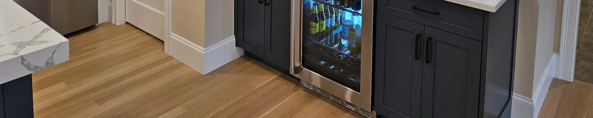 Hardwood in modern kitchen from Flooring Source in the Auburn, MA area